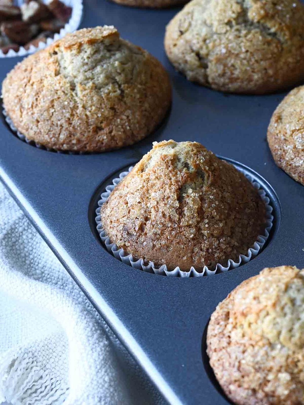 Just baked banana pecan muffins in a muffin tin.
