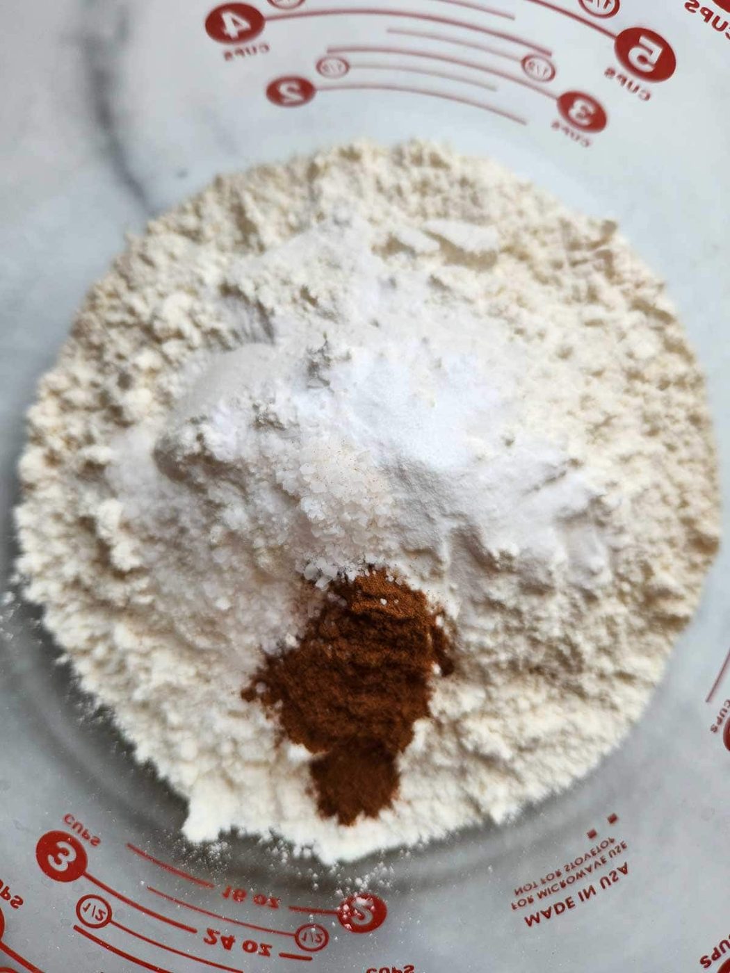Dry ingredients in a clear bowl.