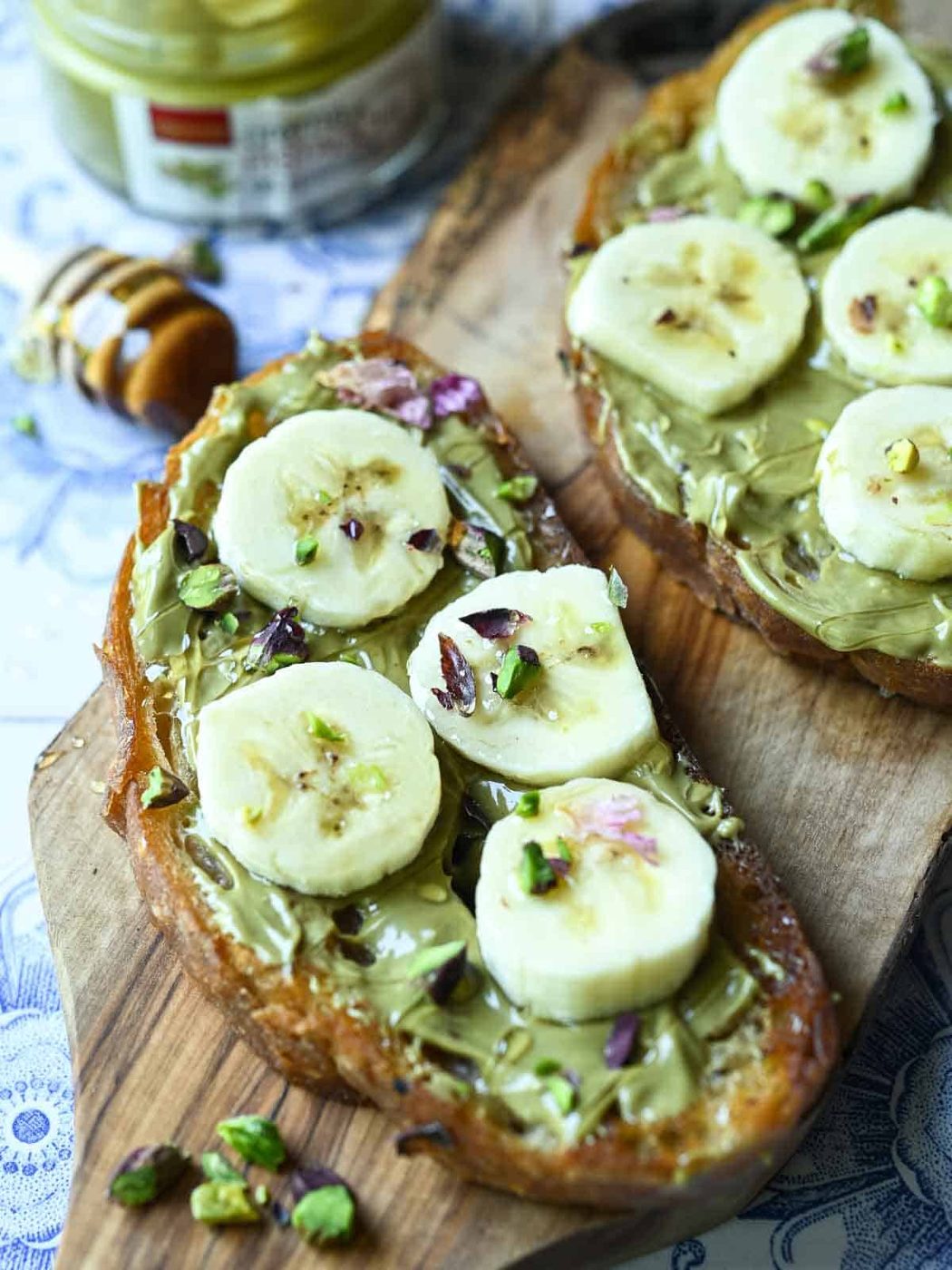 Bananas on toast with pistachio cream and honey.