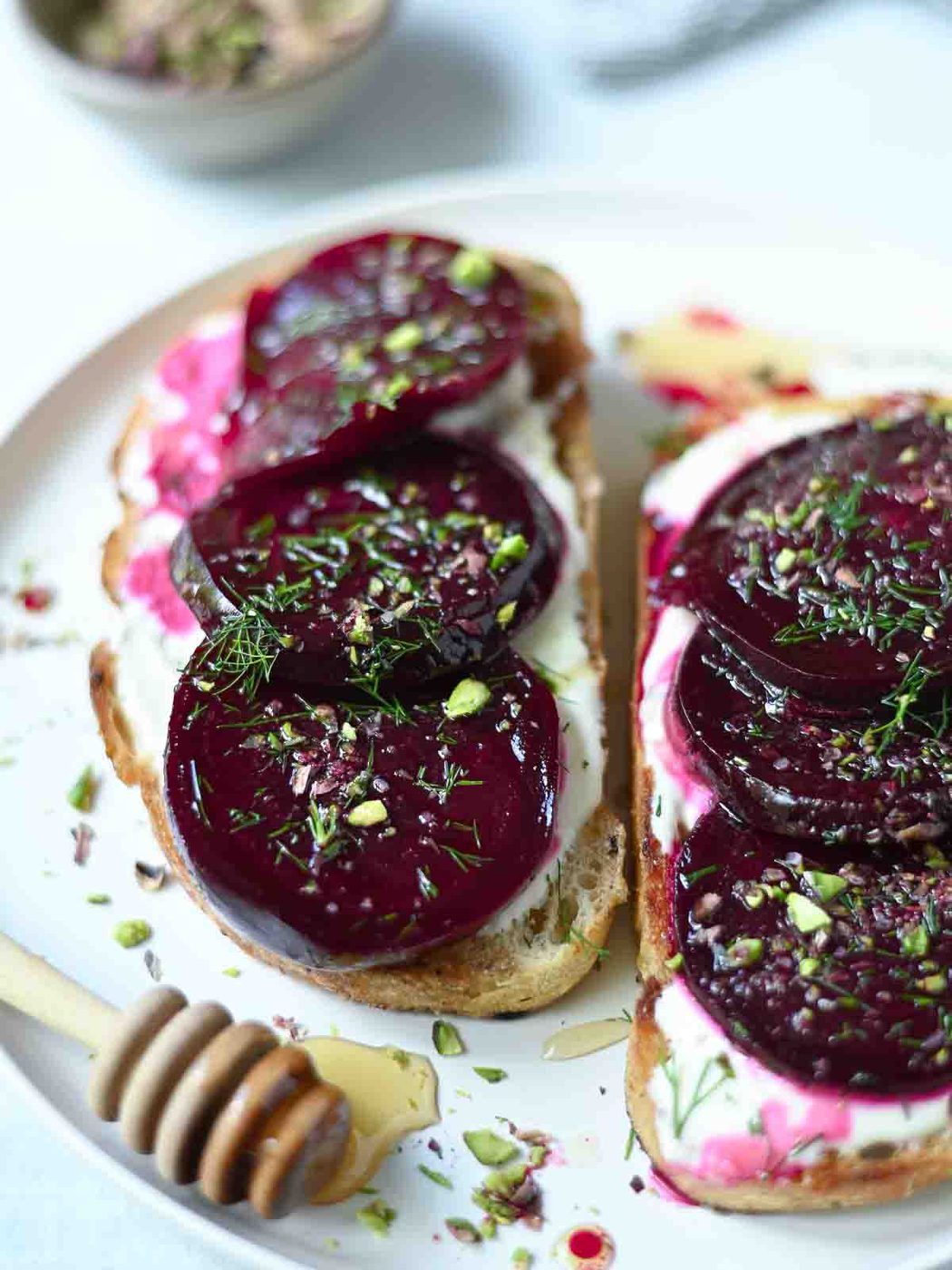 Beet slices on toast with creme Fraiche and dill.