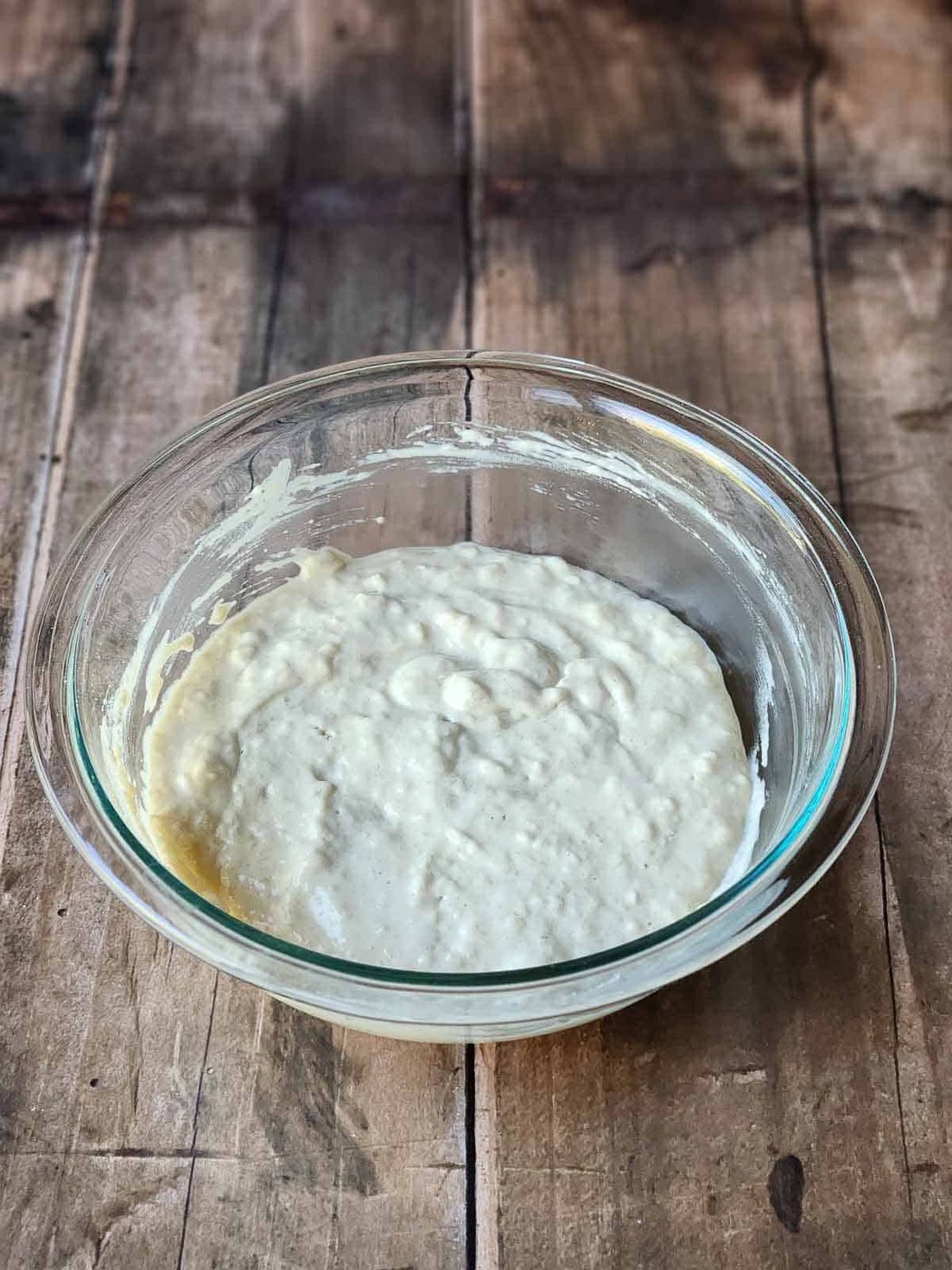 Mixed brown sugar pancake batter in a clear bowl