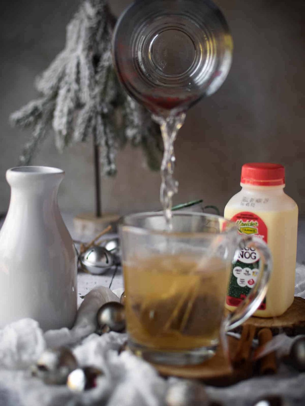 Water being poured over tea bags for tea.