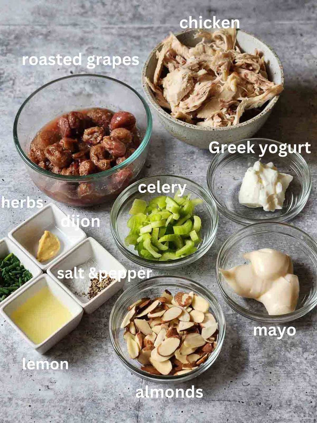 Labeled ingredients on a grey surface.