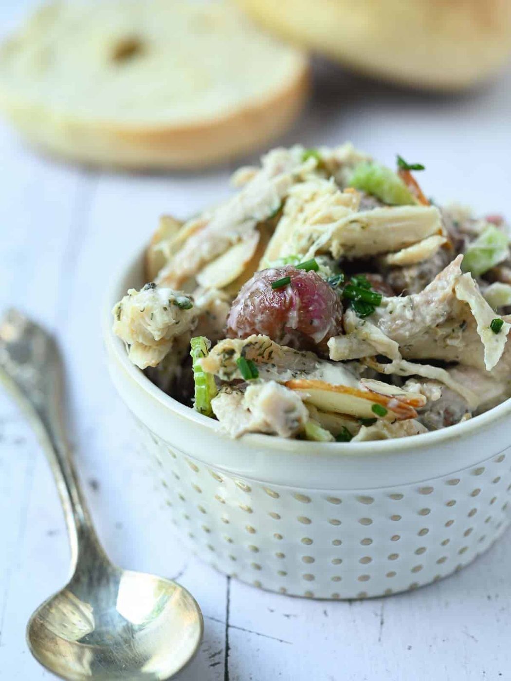 Chicken salad with grapes in a small bowl.