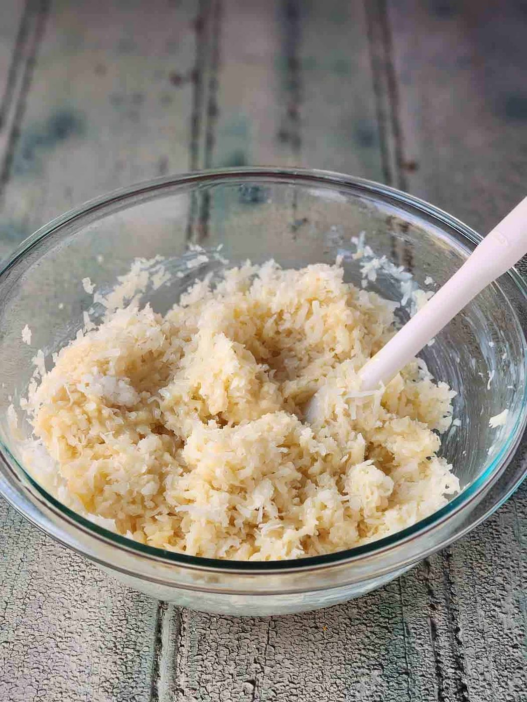 Mixed ingredients in a clear bowl.