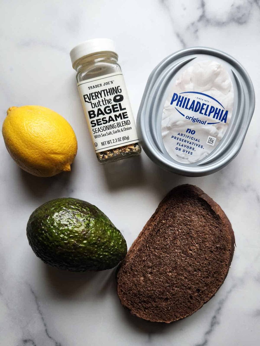 Ingredients for avocado cream cheese toast.