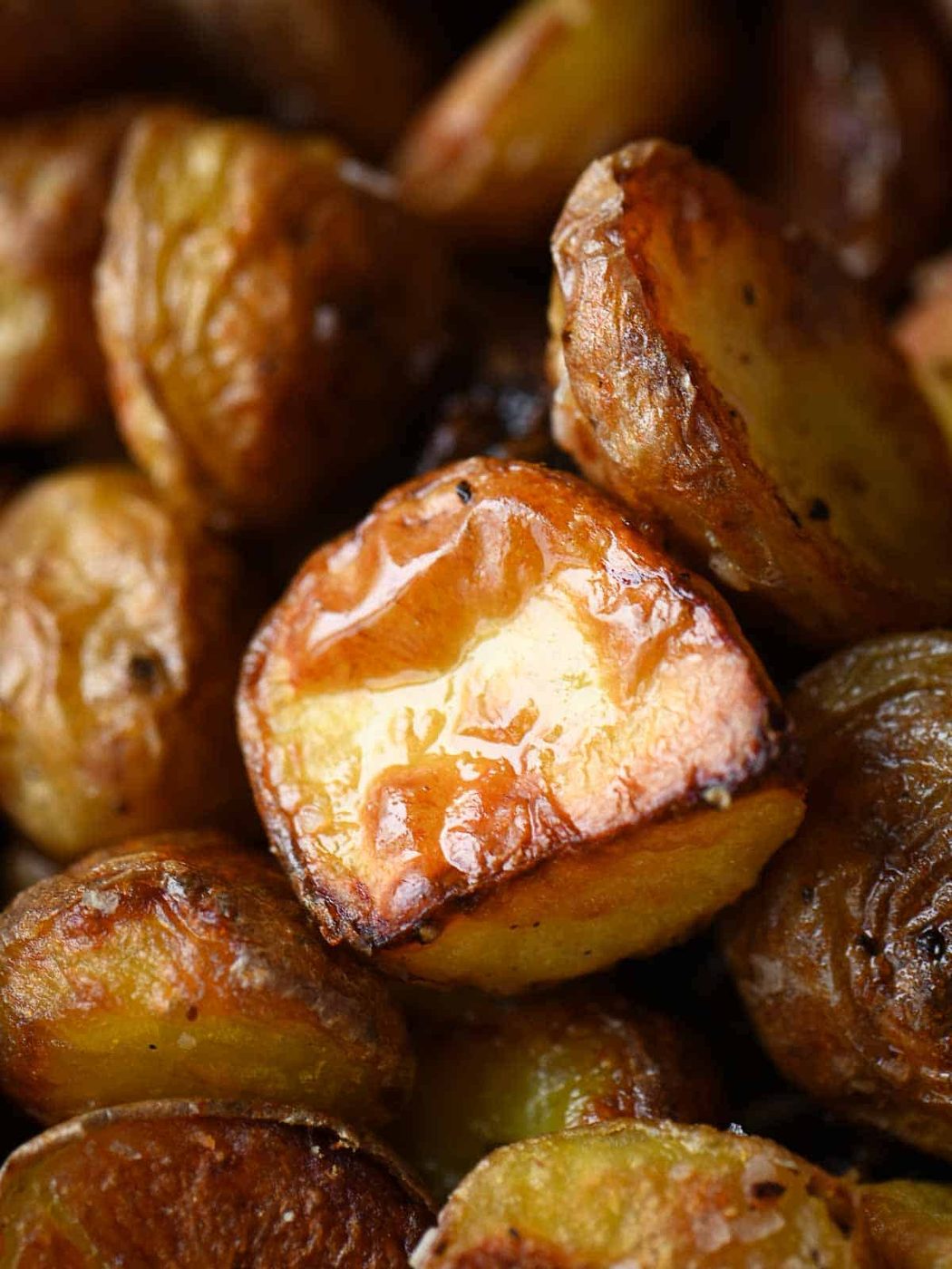 Close up of the detail of a crispy roasted poatatoes.
