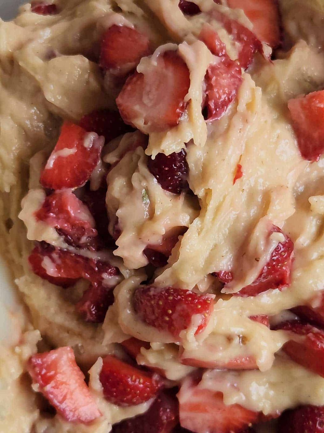Strawberry bread batter process shot.