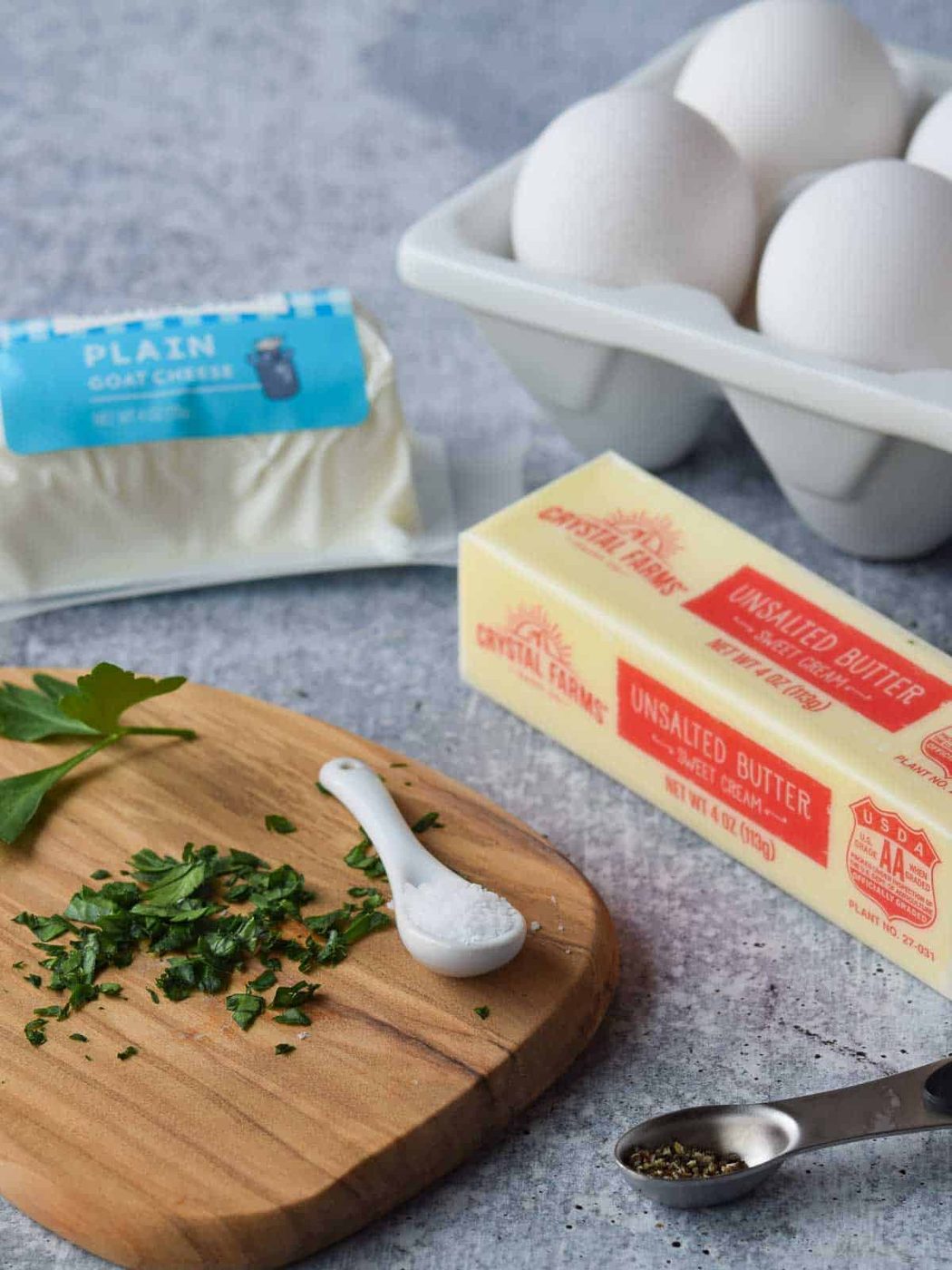 Ingredients for goat cheese scrambled eggs.