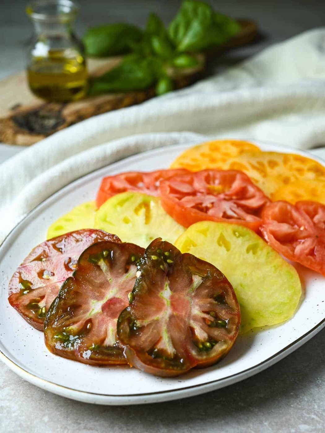 Sliced heirloom tomatoes on a platter.