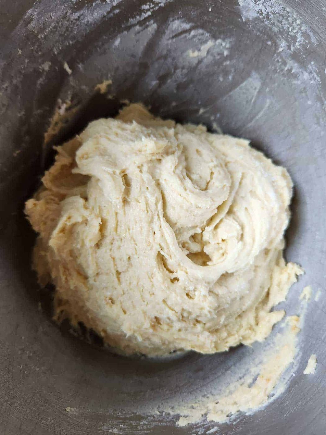 Finished dough in a bowl for lemon drop cookies.