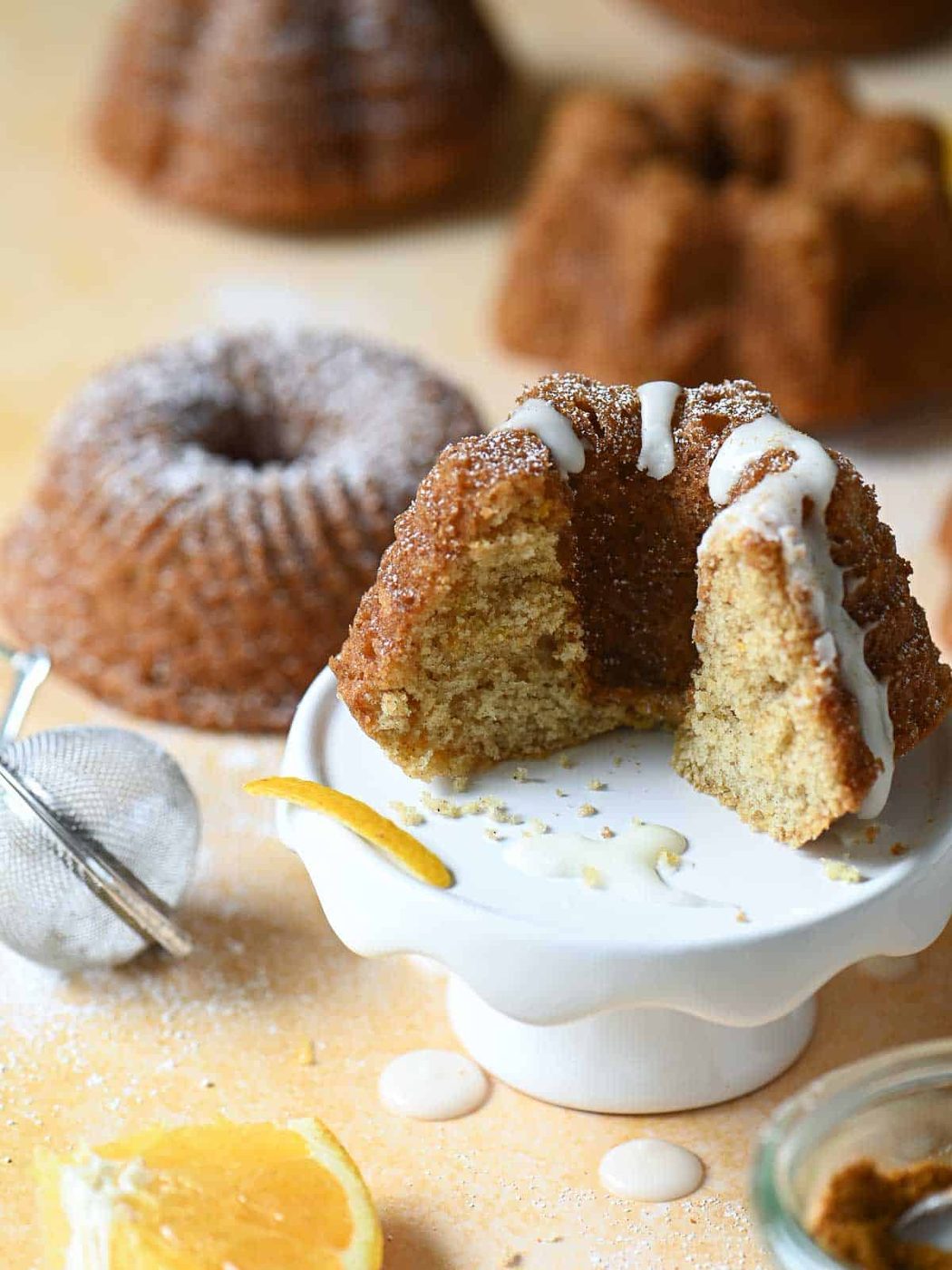 A bundt cake sliced open showing the texture of the cake.