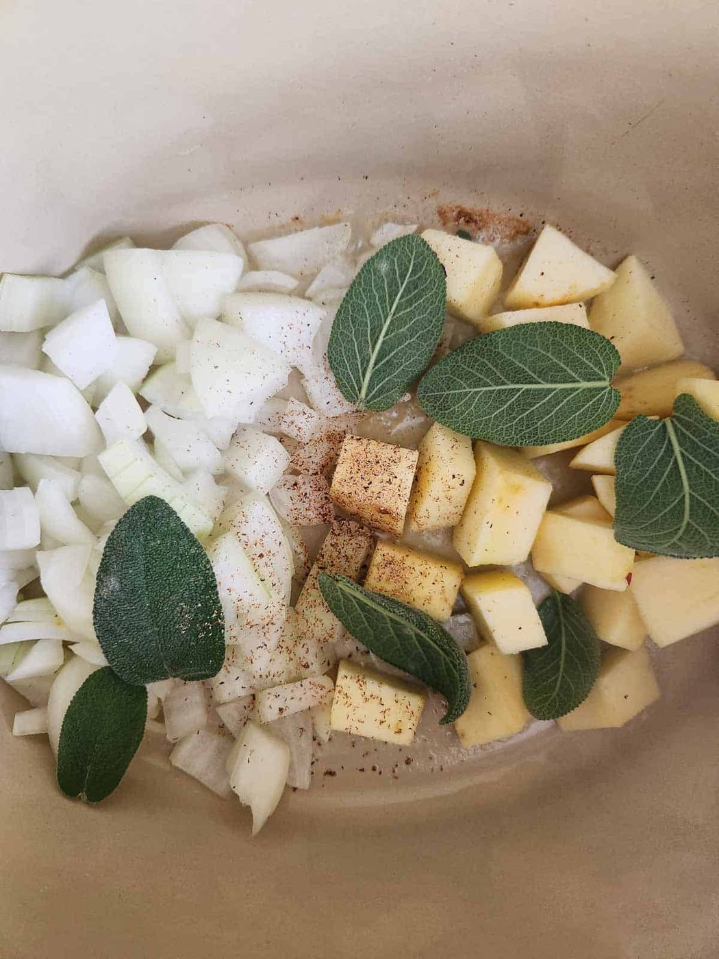 Ingredients in a pot for squash soup.