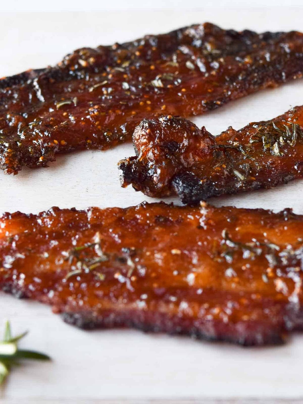 Close-up of candied rosemary and fig bacon.
