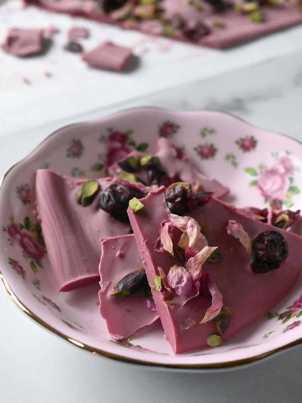 Ruby chocolate bark in a pick flower bowl.