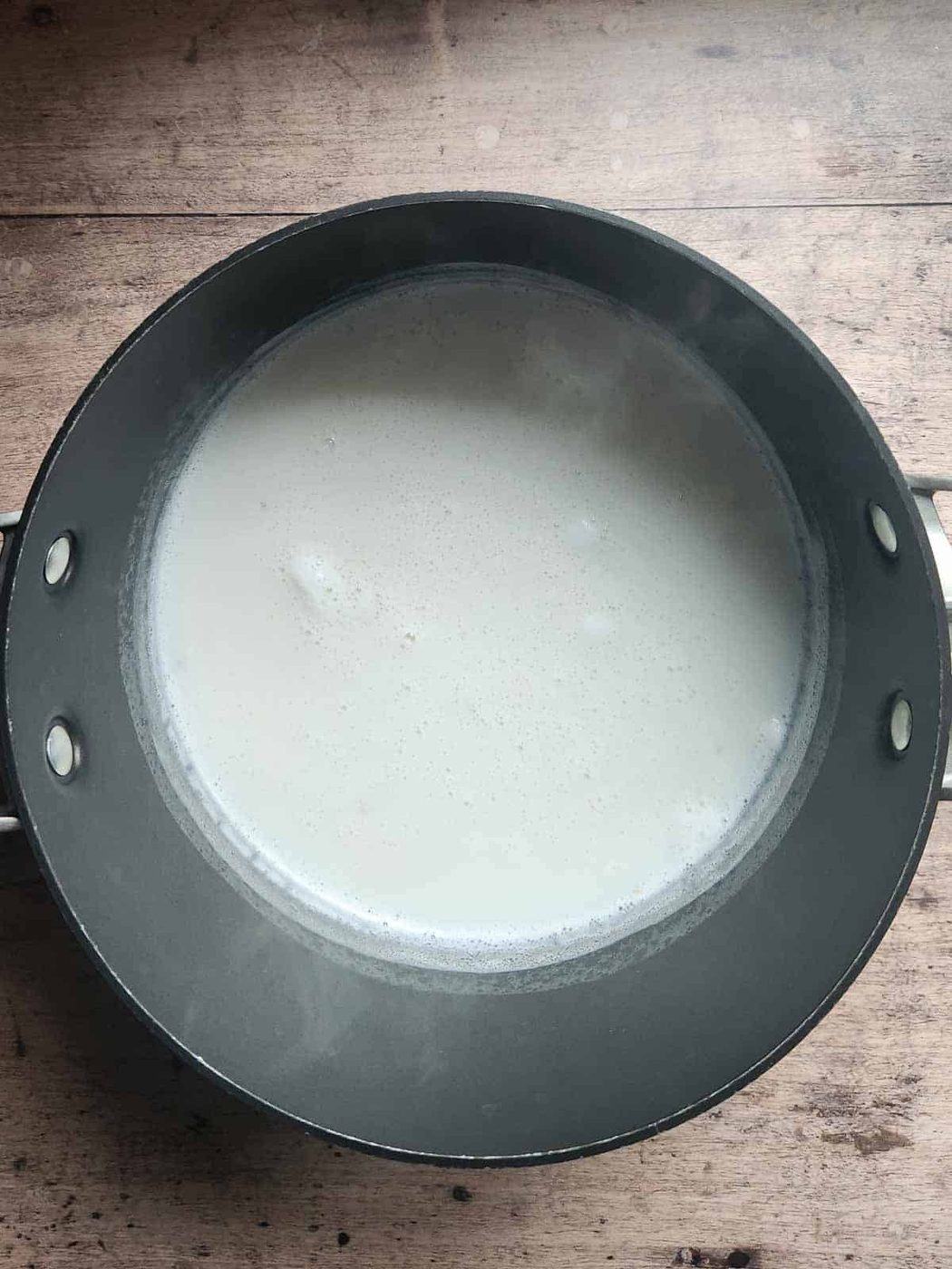 Milk in a large pot.