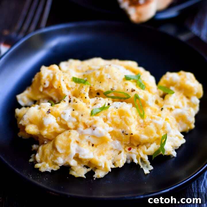 Gordon Ramsay's perfect scrambled eggs, featuring a rich, creamy texture and vibrant color, ready to be served.