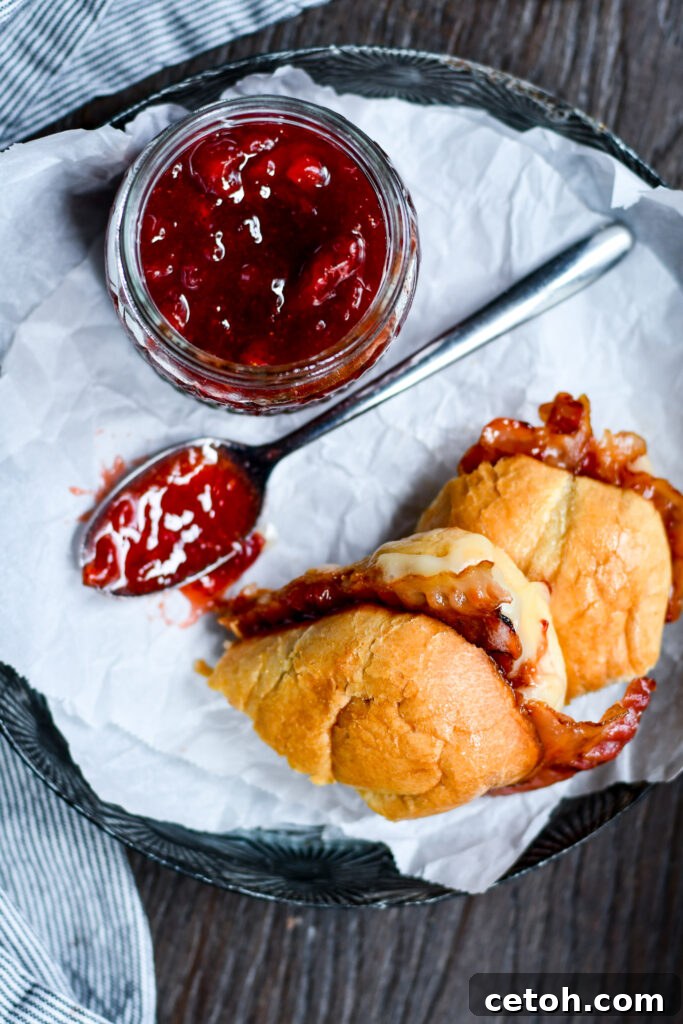 Indulge in the yummiest Brie Grilled Cheese with Bacon and Strawberry Jam! A gourmet twist on a classic comfort food.