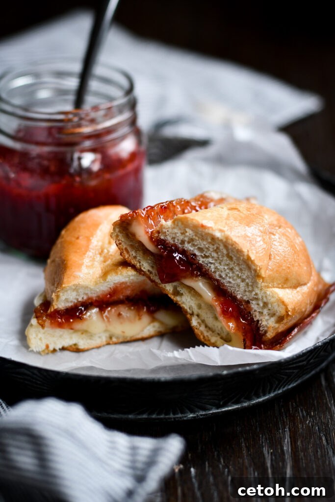 Upgrade your grilled cheese game with this Brie, Bacon, and Strawberry Jam combo! Pure comfort food bliss.