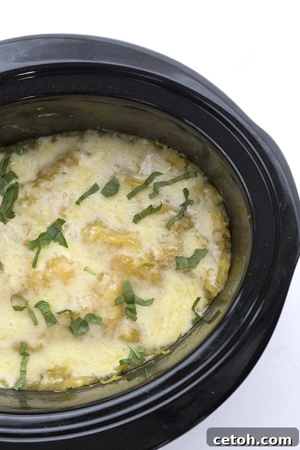 Easy low carb three cheese spaghetti squash recipe made in the crockpot