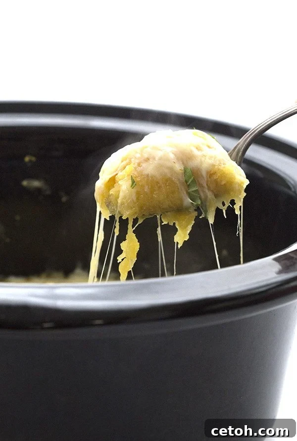 So cheesy! Delicious three cheese slow cooker spaghetti squash