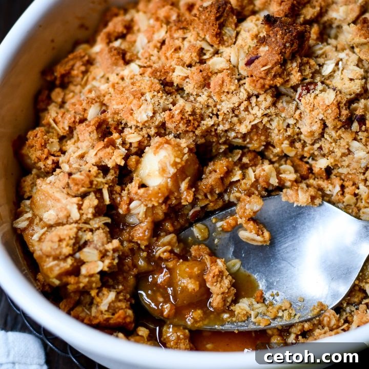 Apple crisp with Quaker Oats in a baking dish.