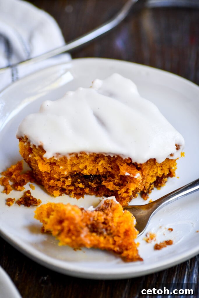 This easy Pumpkin Cinnamon Roll Cake is the ultimate fall dessert, combining pumpkin spice and cinnamon swirls in one delicious cake. Perfect for cozy evenings!