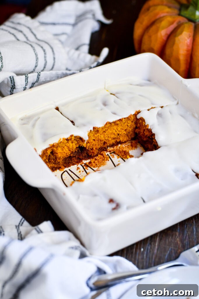 Try this fluffy and moist Pumpkin Cinnamon Roll Cake – a fall recipe that's easy to make and loaded with comforting flavors.