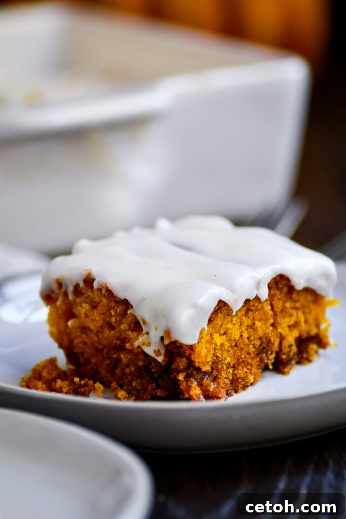 Whip up this Pumpkin Cinnamon Roll Cake in no time! With warm spices and a sweet cinnamon swirl, it's the ultimate fall treat.