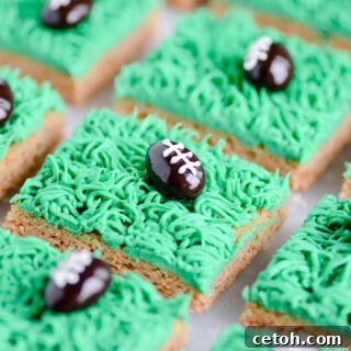 Touchdown Desserts: 15 Effortless Super Bowl Sweets 3 Soft peanut butter cookie bars decorated like a football field with green vanilla frosting and chocolate almond footballs.
