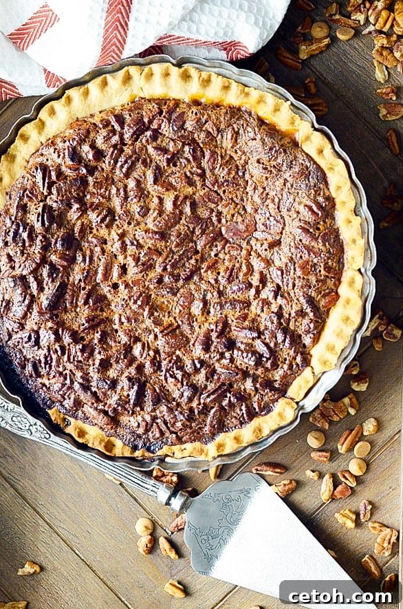 A golden, gooey pecan pie with sweet butterscotch chips — the ultimate cozy fall dessert.