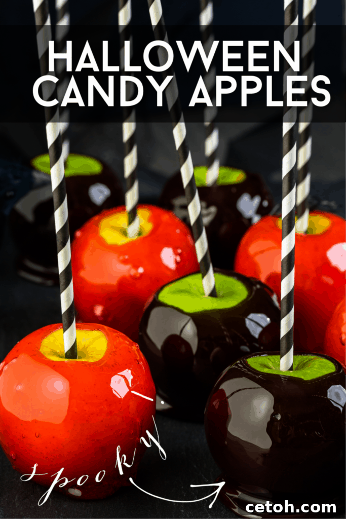 Close-up of a perfectly crafted black Halloween candy apple with a glossy, hard coating, ready to be enjoyed.