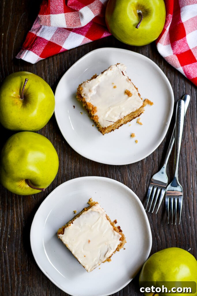 Delicious applesauce cake with creamy maple icing, a must-try fall dessert recipe.