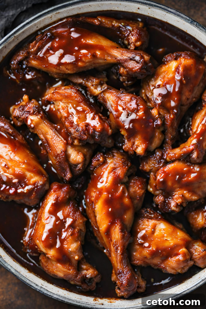 Learn the art of making Sticky BBQ Wings in the Oven with this delicious recipe.