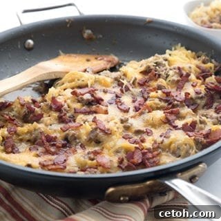Keto Cheeseburger Spaghetti Squash Casserole simmering in a large skillet