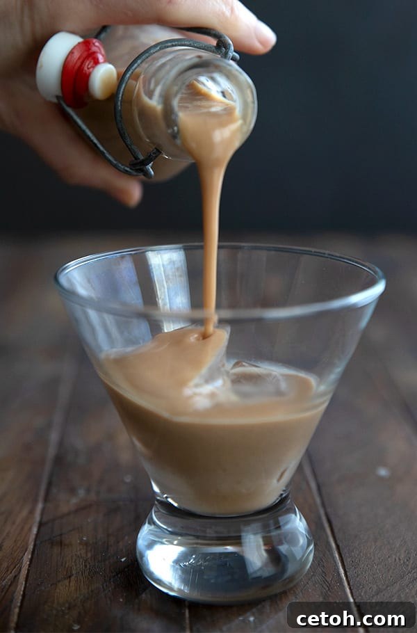 Keto Countdown Nibbles for New Year's Eve 21 Close up shot of keto Irish Cream being poured into a glass.