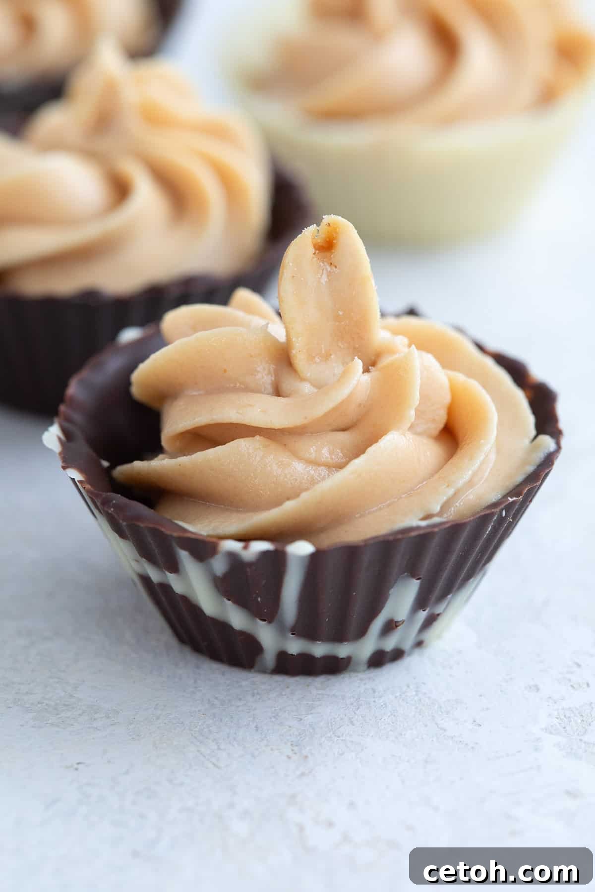 Keto Countdown Nibbles for New Year's Eve 24 Close up shot of a Chocolate Dessert Cup filled with peanut butter mousse.