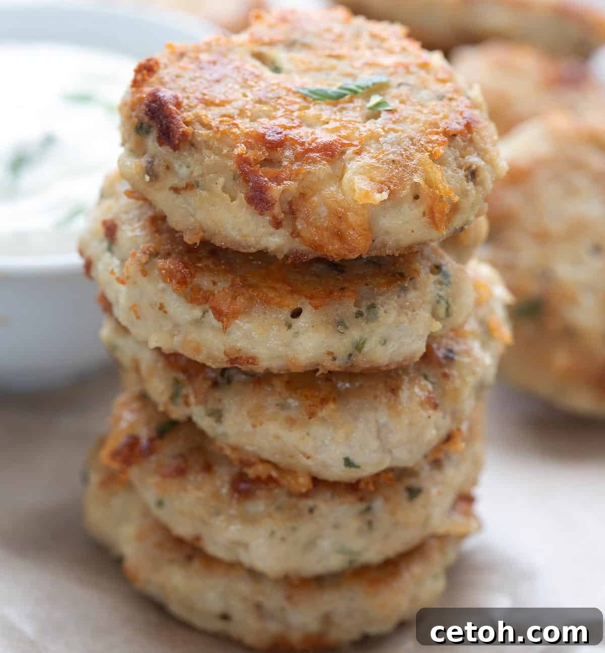 Keto Countdown Nibbles for New Year's Eve 5 Close up shot of a stack of Keto Chicken Fritters.