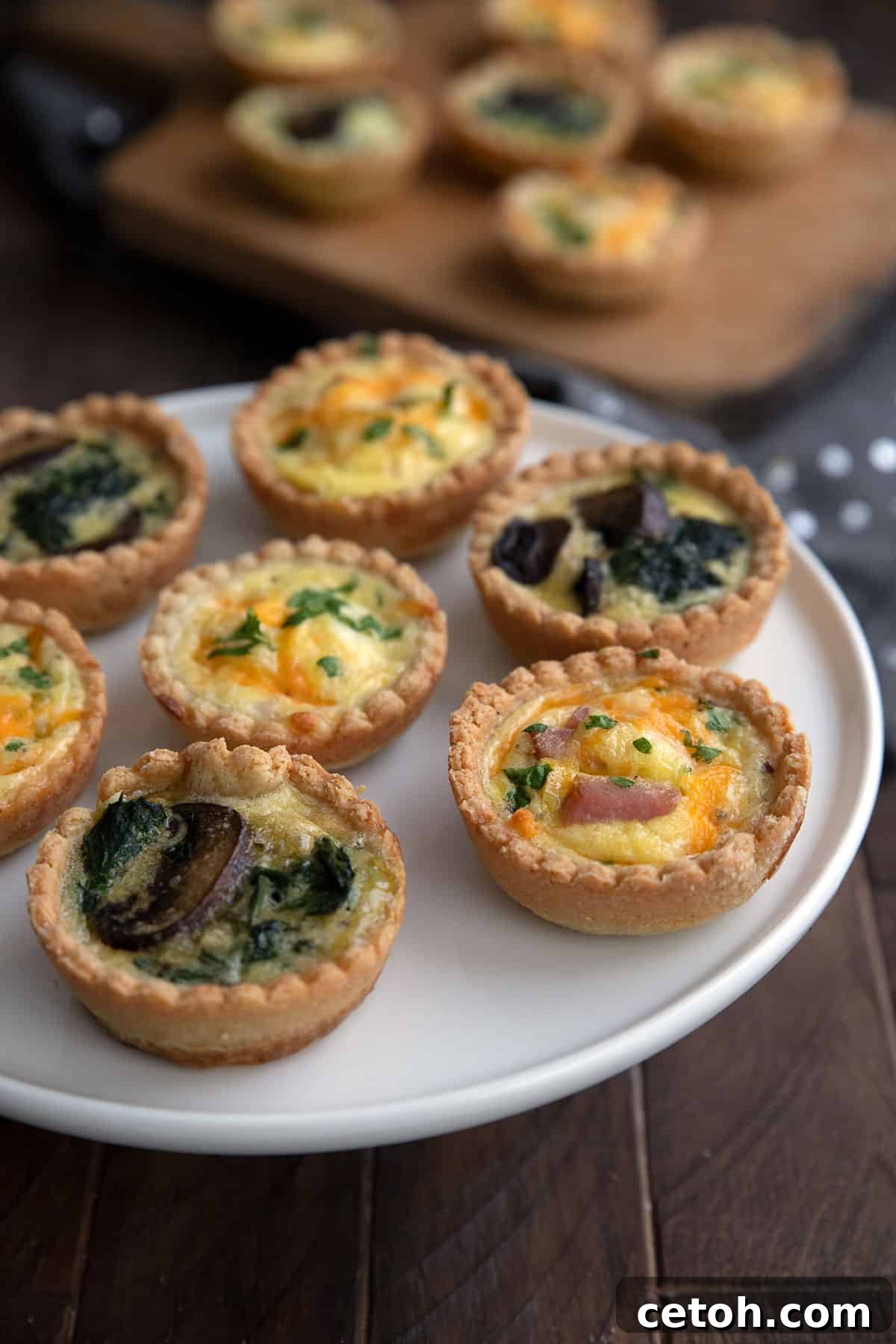 Keto Countdown Nibbles for New Year's Eve 7 A serving tray filled with two flavors of keto mini quiche.