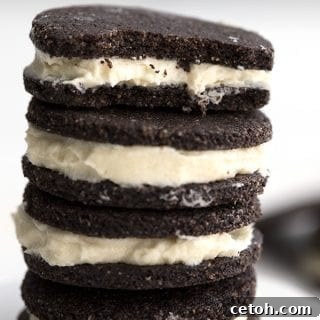 Close up shot of keto oreo cookies with a bite taken out of the top cookie
