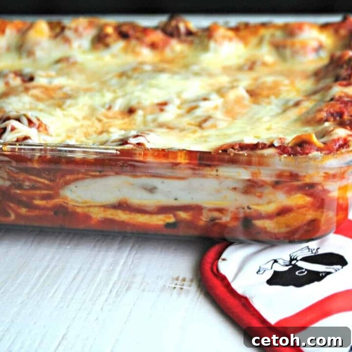A hearty and cheesy Authentic Italian Lasagna, baked to golden perfection.