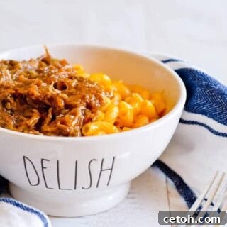 A rich and creamy Memphis Mac & Cheese dish, topped with golden-brown breadcrumbs.