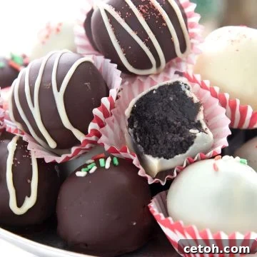 Minty Keto Chocolate Cookie Truffles 2 Close up shot of keto peppermint truffles with a bite taken out of one.