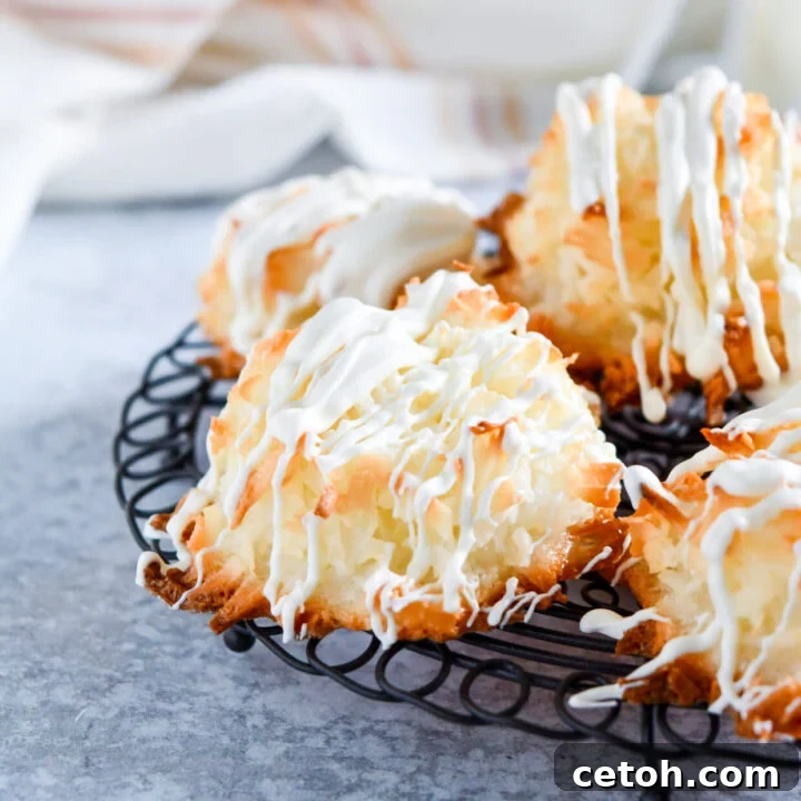 Delicate white chocolate macaroons, simple to make and elegantly drizzled.