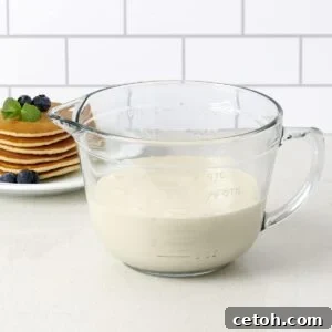 Batter mixing bowl with convenient pouring spout