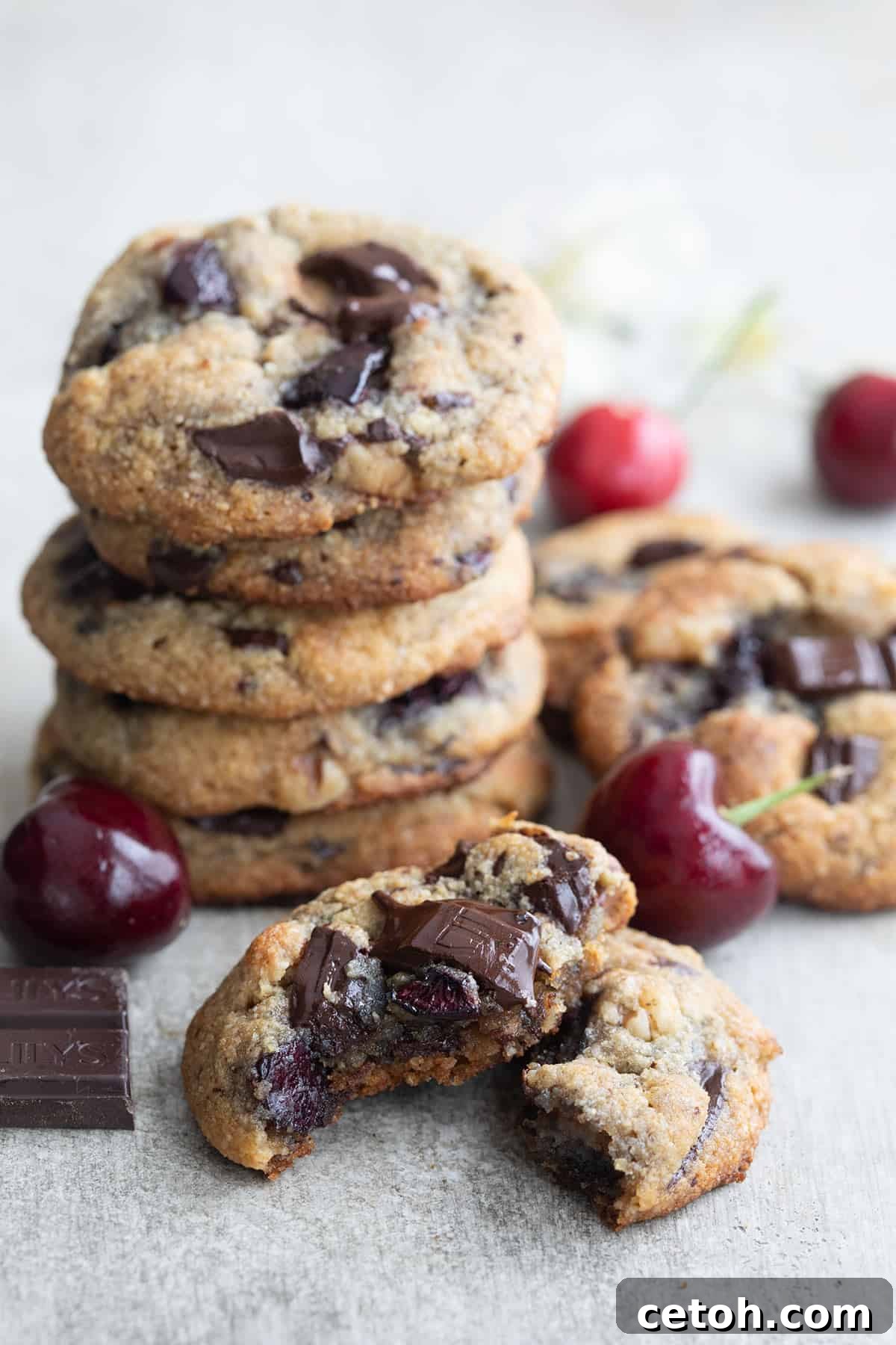 Decadent Keto Cherry Chocolate Chunk Cookies 3 A Cherry Chocolate Chunk Cookie broken open to show the inside.