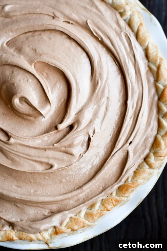 This creamy, dreamy No-Bake Chocolate Silk Pie is rich, fluffy, and completely irresistible. No oven needed — just silky chocolate perfection in every bite!