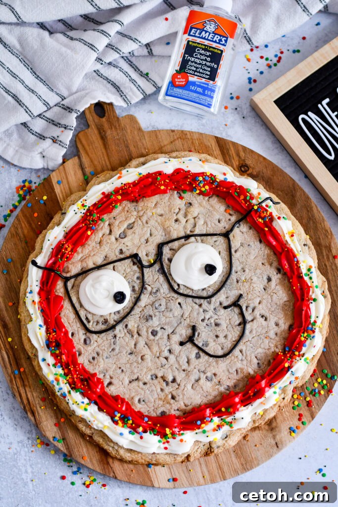 Celebrate back-to-school season with this adorable 'Smart Cookie' cake recipe! Easy, fun, and perfect for kids' school snacks and treats. #BackToSchool #CookieCake
