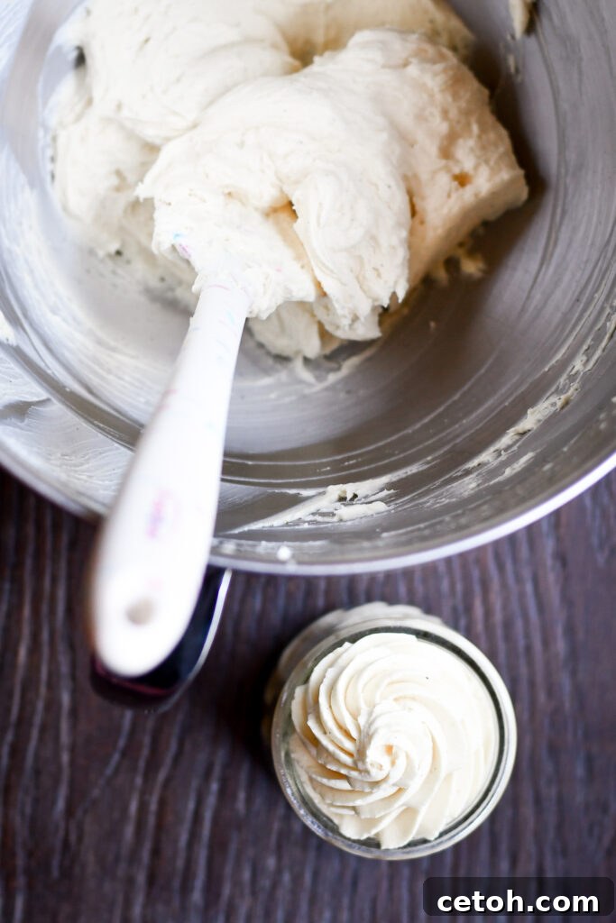 Easy homemade stabilized whipped cream for piping and decorating cakes, cupcakes, and pies without melting or losing shape.