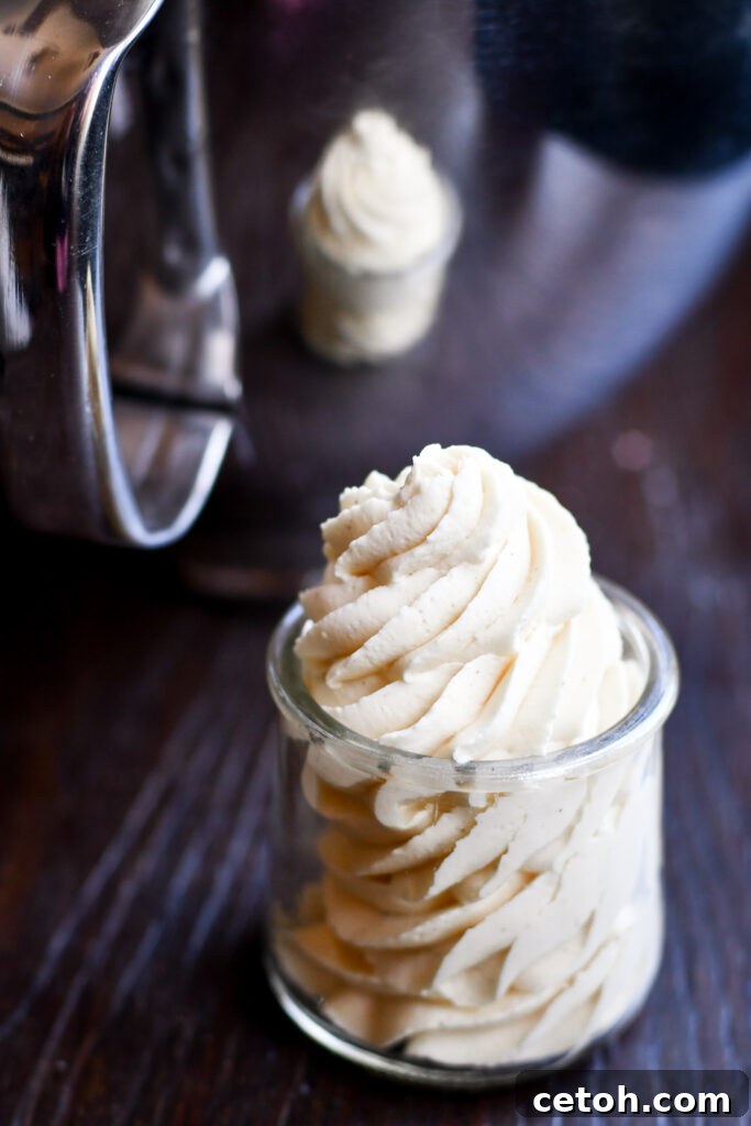 Want whipped cream that doesn't fall flat? This stabilized recipe is a game-changer for your cake and dessert decorating, ensuring perfect results.